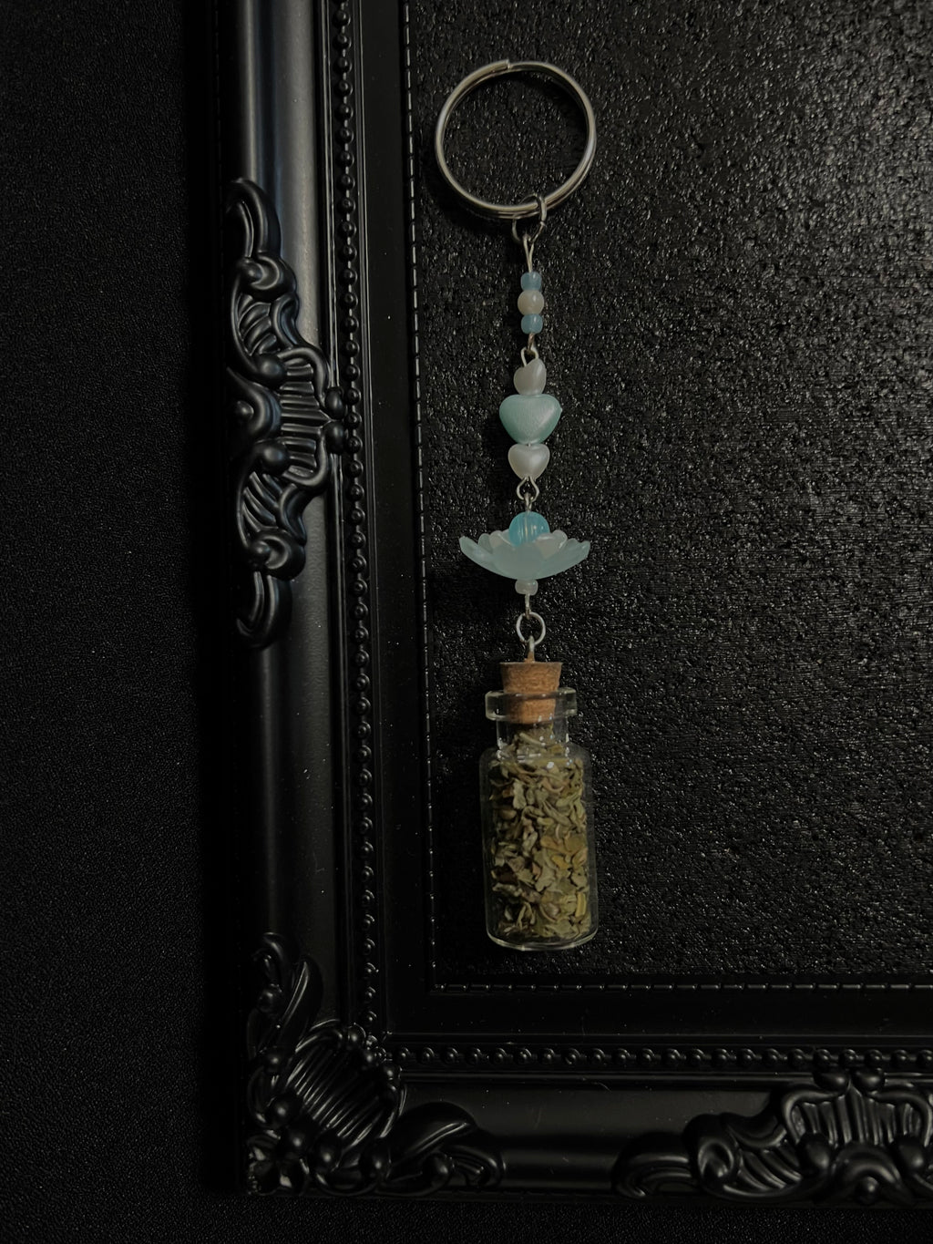 Ring Charms for Feline and Cat Lovers. Can be connected to keys and or a hand bag or backpack. Coquette and Gothic Accessories for Cat Owners and Cat Lovers. Blue Lotus flower and Pearl Blue Heart