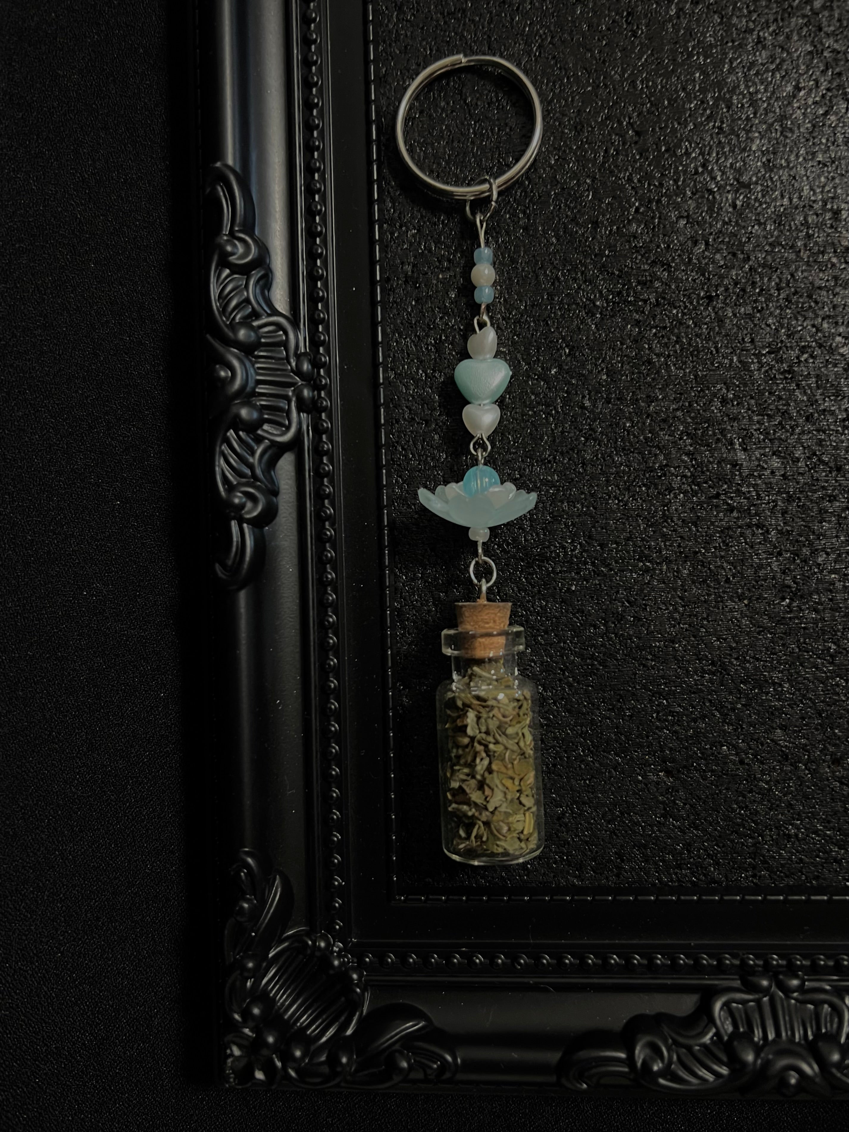 Ring Charms for Feline and Cat Lovers. Can be connected to keys and or a hand bag or backpack. Coquette and Gothic Accessories for Cat Owners and Cat Lovers. Blue Lotus flower and Pearl Blue Heart