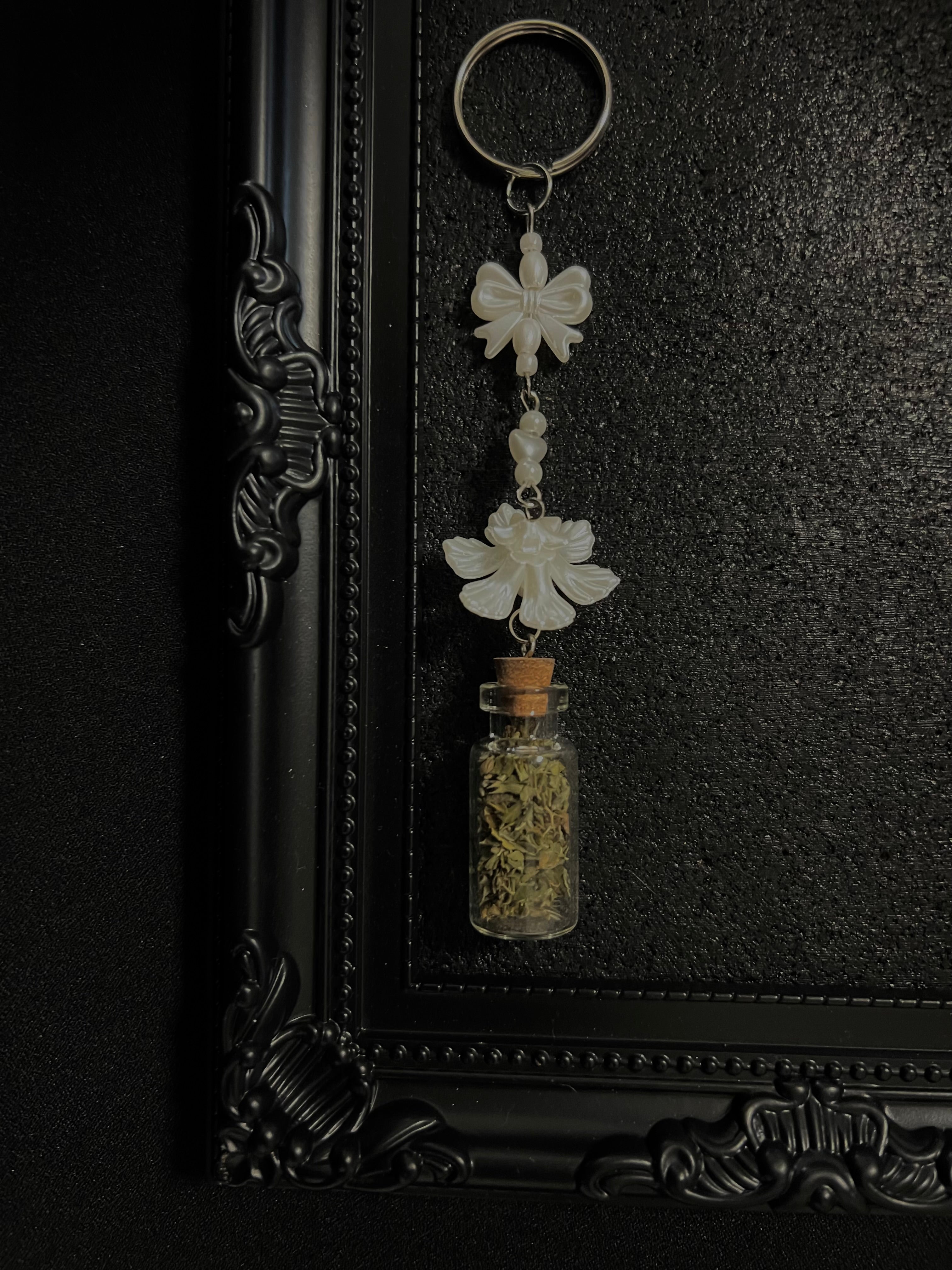 Ring Charms for Feline and Cat Lovers. Can be connected to keys and or a hand bag or backpack. Coquette and Gothic Accessories for Cat Owners and Cat Lovers. White Pearlescent Flower and Pearl Bow 