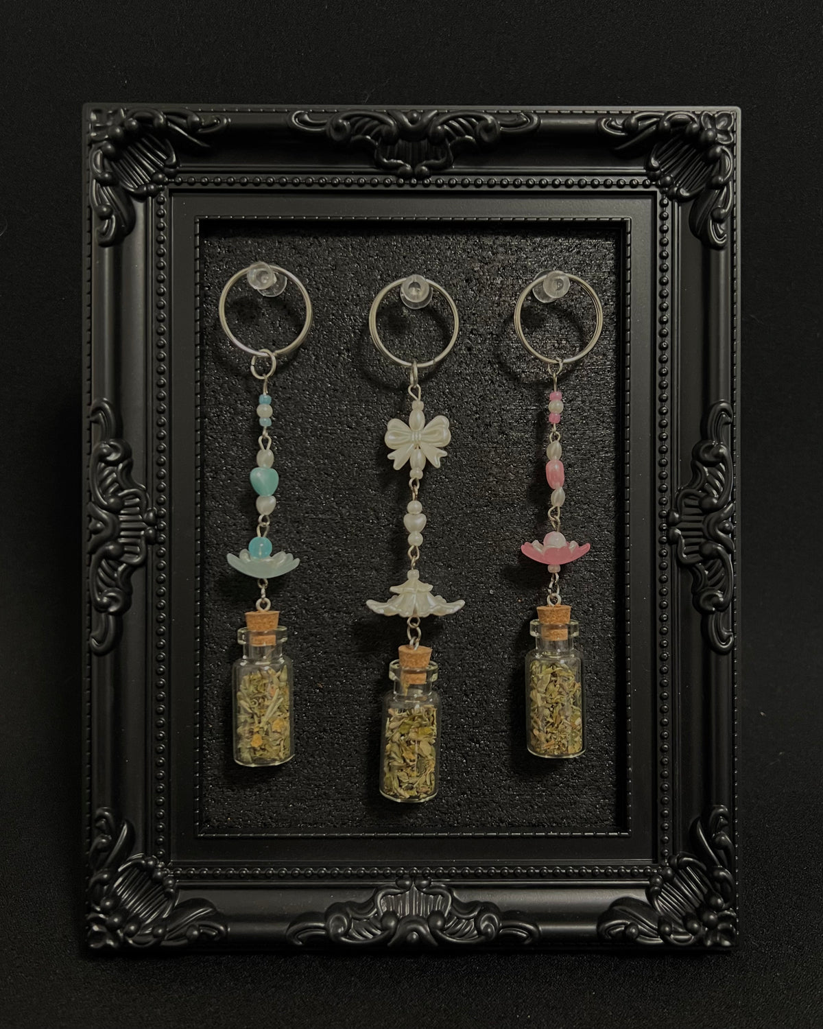 Cute Kawaii Adorable Handmade Crafted Catnip Vial Key Chains and Key Ring Charms for Feline and Cat Lovers. Can be connected to keys and or a hand bag or backpack. Coquette and Gothic Accessories for Cat Owners and Cat Lovers. 
